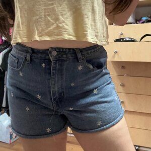 ean shorts with embroidered flowers on them!!